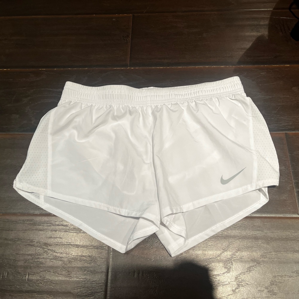 White Nike shorts